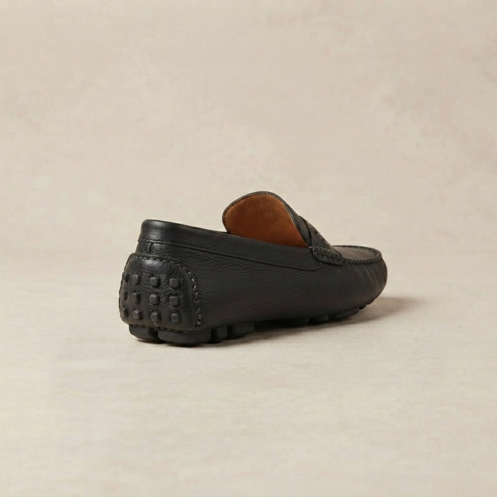 Black Leather Ponente Driving Shoe with Pebble Rubber Sole – heel view