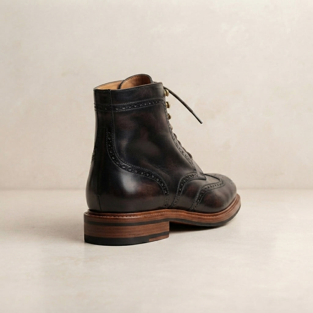 Black Leather Scirocco Boot with Natural Leather Sole – heel view