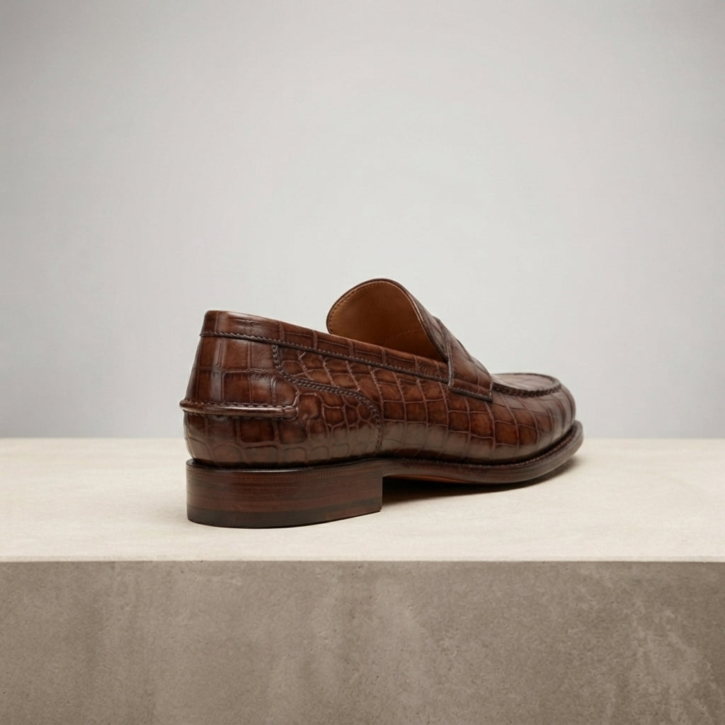 Brown Crocodile-Print Leather Garbin Penny Loafer with Natural Leather Sole – heel view