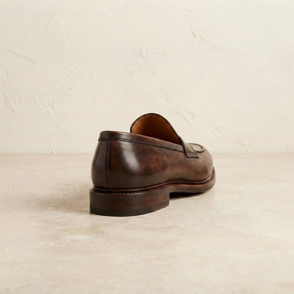 Brown Leather Garbin Penny Loafer with Natural Leather Sole – heel view