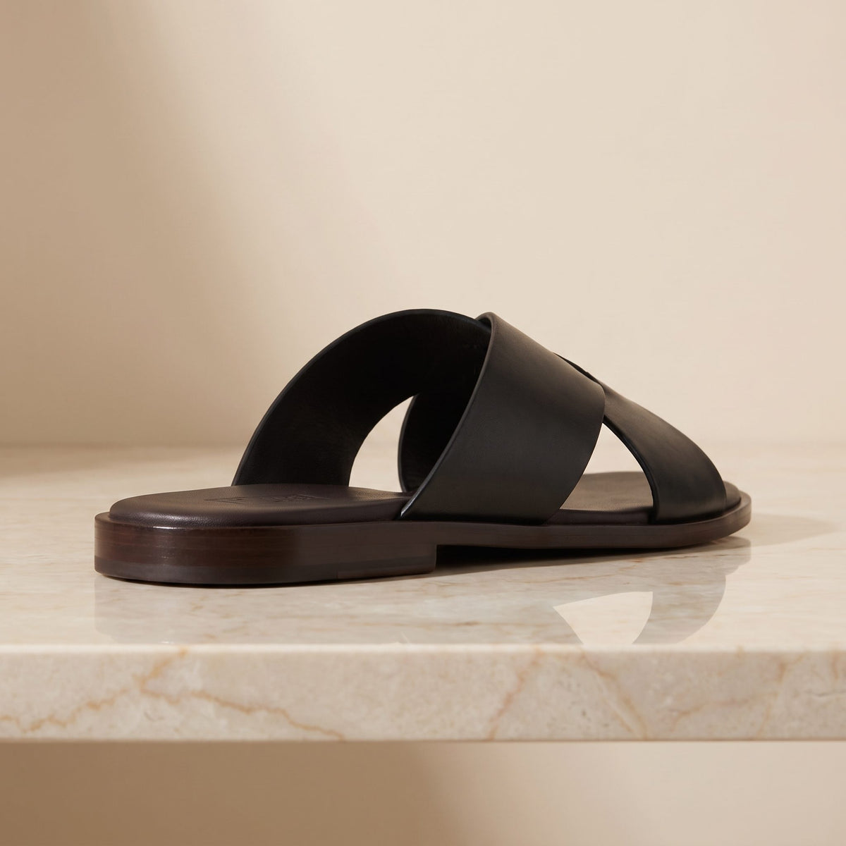Black Leather Varenna Cross-Strap Slide Sandal – back view