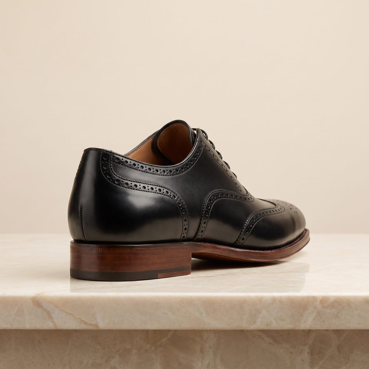 Black Leather Caprera Spectator Wingtip Derby – back view