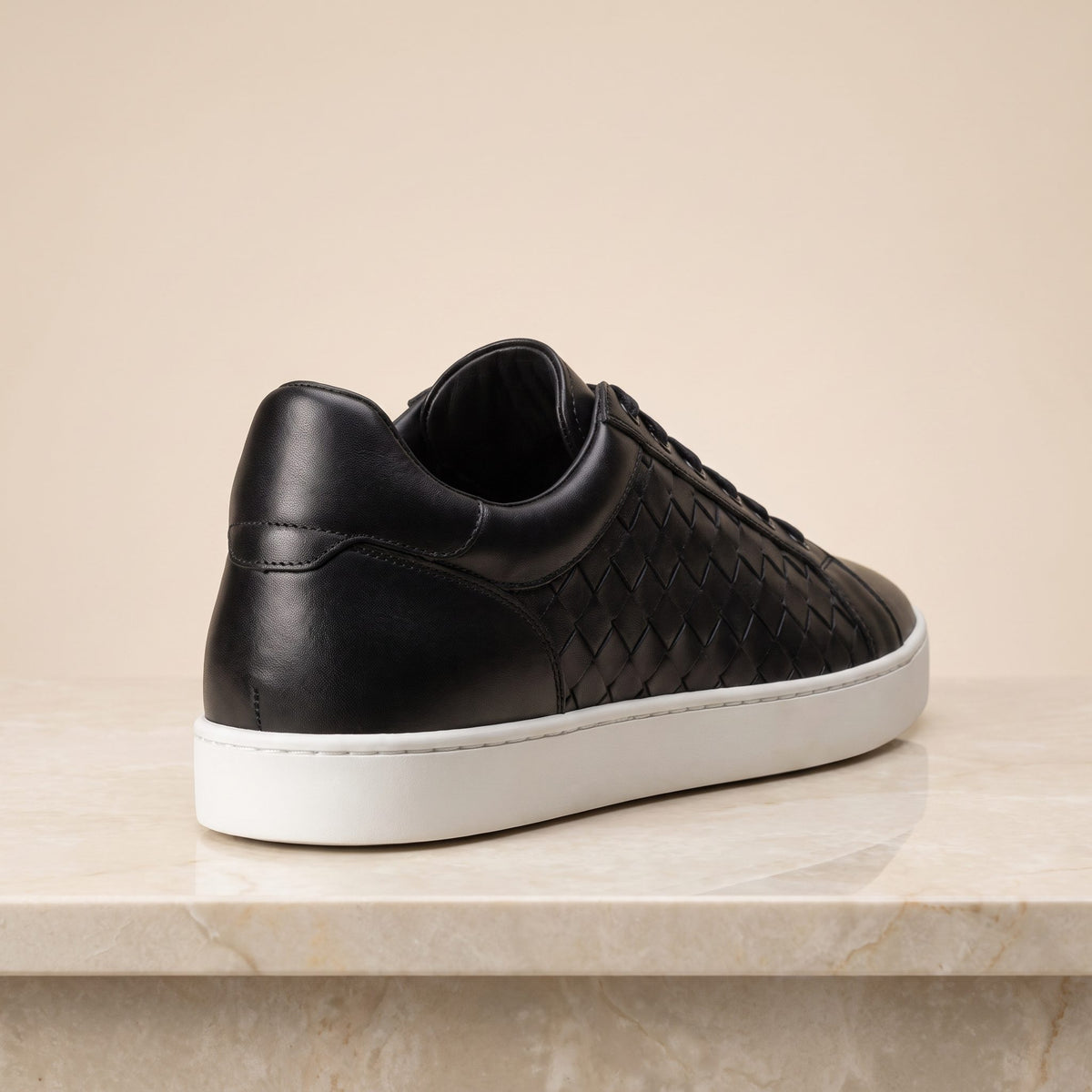 Black Leather Gravina Woven Sneaker – back view