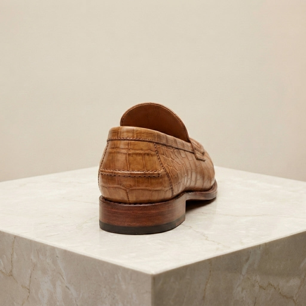 Tan Crocodile-Print Leather Garbin Penny Loafer with Natural Leather Sole – heel view